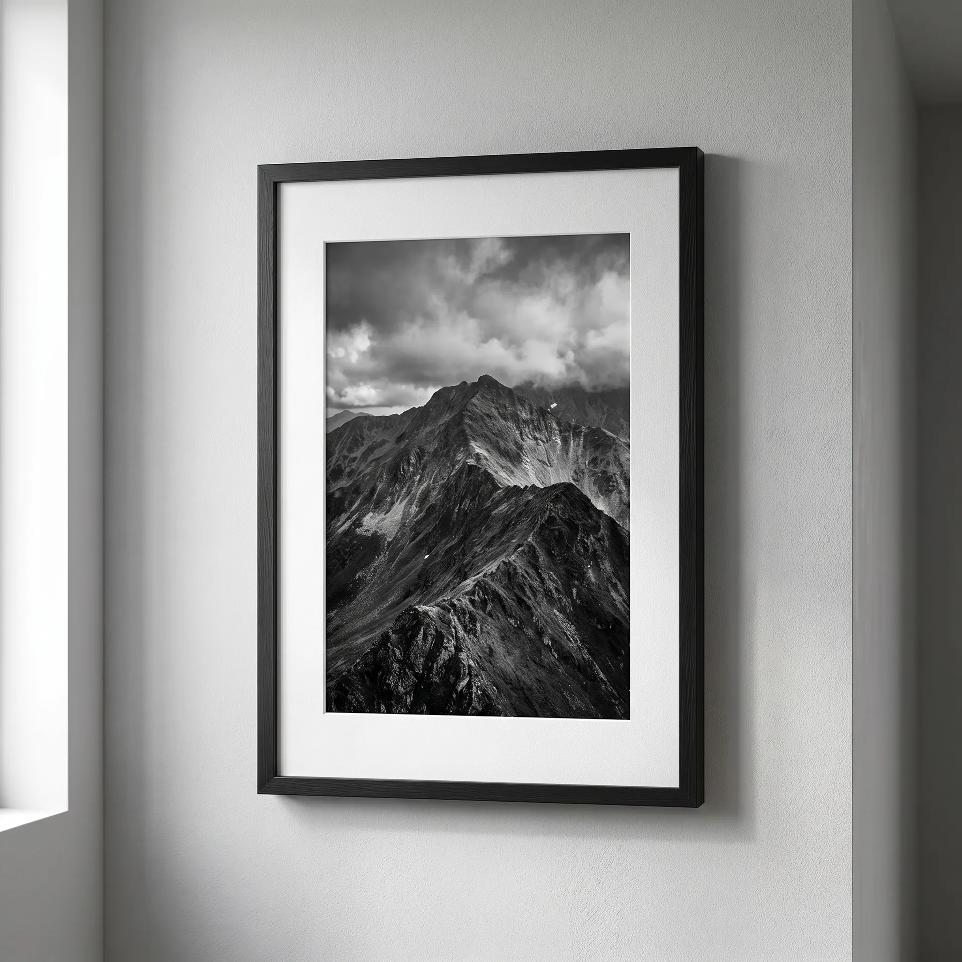 Printed photograph in a slim black frame with a white mat, shown with a sample design: on a hallway wall in a home
